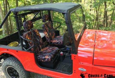 This Mahindra Roxor3 looks great with custom seat covers