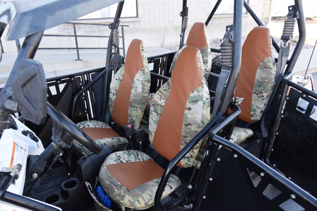 2012 Polaris RZR front UTV camo seat covers with Saddle Ostrich simulated leather inserts and MultiCam Original canvas trim