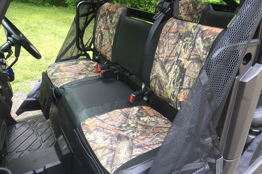 2019 Polaris Ranger rear bench seat covers with Mossy Oak NB Country canvas inserts and Black Carbon Fiber simulated leather trim