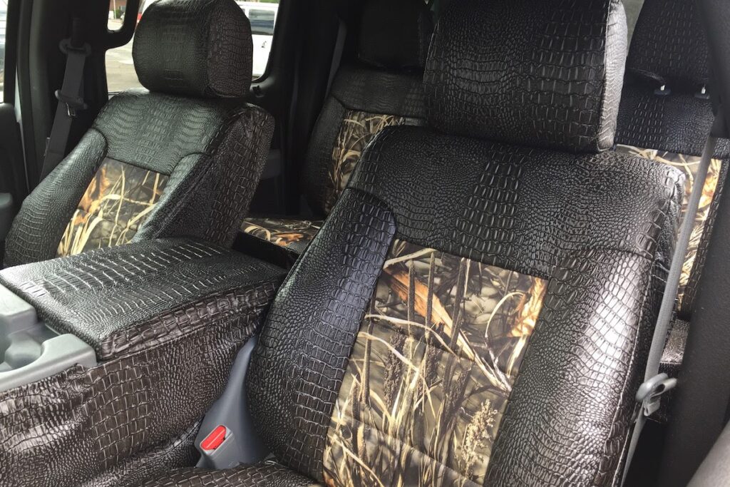 2014 Ford F150 front seat covers in Realtree Max-4 HD camouflage and Ebony Croc trim