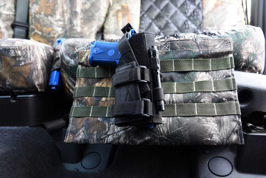 2011 Ford F-350 rear seat covers with Ebony Croc Diamond inserts and Realtree Xtra camouflage trim