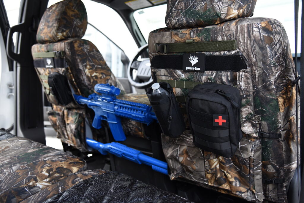 2011 Ford F-350 camouflage seat covers with Ebony Croc Diamond inserts and tactical MOLLE seat-back organizer