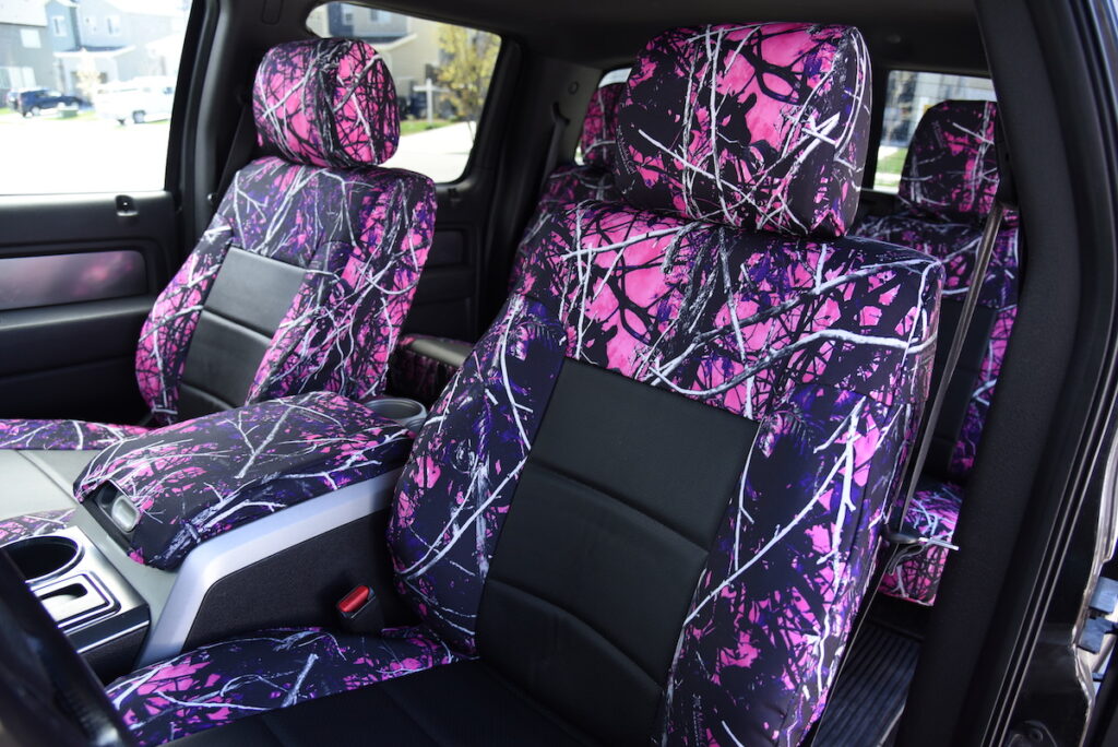2014 Ford F-150 front seat covers with Black Perforated Sof-Touch inserts and Sirphis Muddy Girl camouflage trim