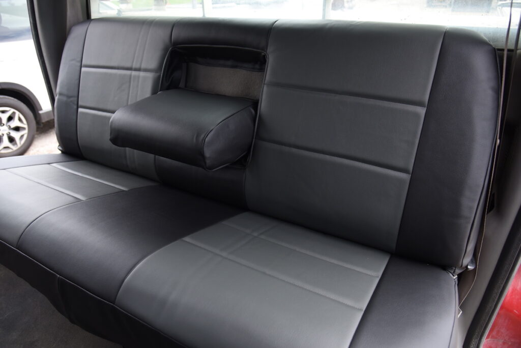 2001 Ford F-550 rear leatherette seat covers with Charcoal Sof-Touch inserts and Black Sof-Touch trim