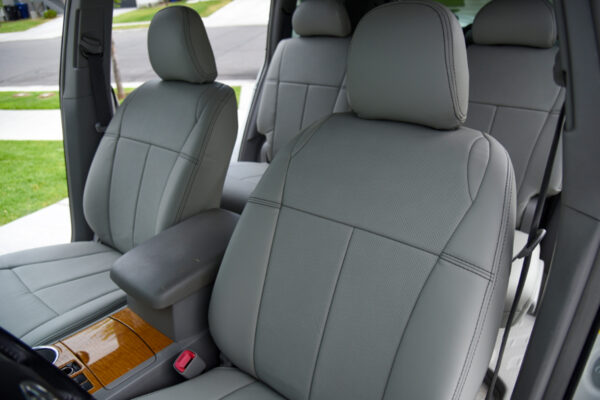 2010 Toyota Highlander front seats with light gray genuine leather seat covers