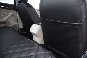 2019 Volkswagen Jetta rear seat with fold-down center armrest and Black Ostrich Diamond seat covers