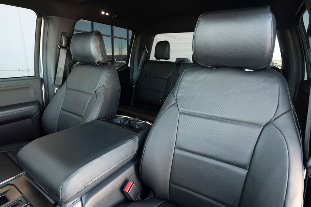 2021 Ford F-150 front seat covers in Black Carbon Fiber and Black Sof-Touch simulated leather