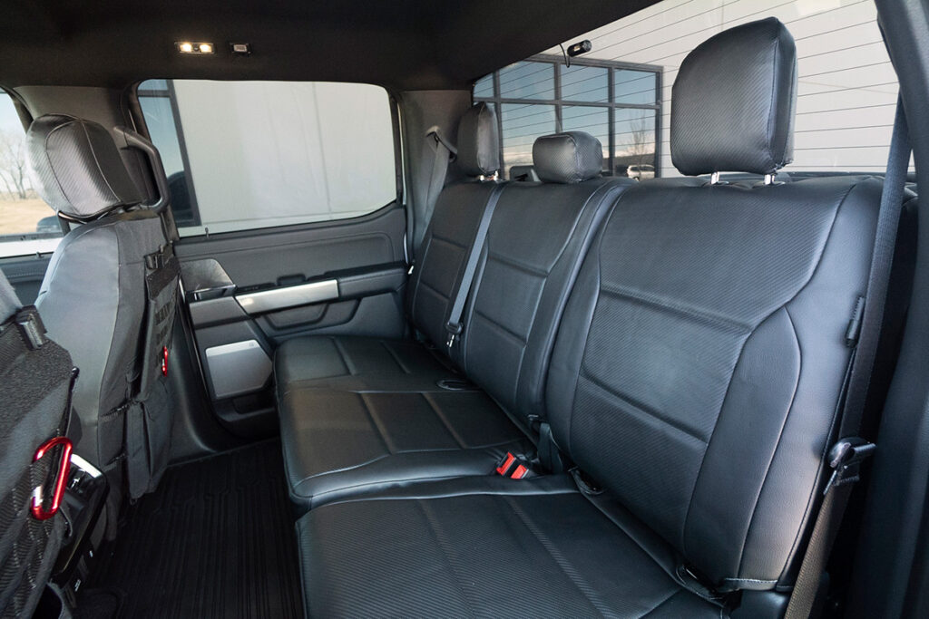 2021 Ford F-150 rear seat covers in Black Carbon Fiber and Black Sof-Touch simulated leather