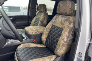 2023 Chevy Silverado 1500 front Kryptek Highlander seat covers with Black Sof-Touch Diamond inserts