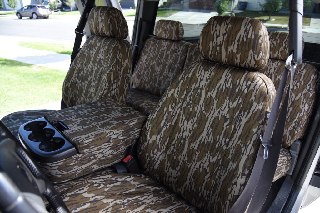 2008 Chevy Silverado 1500 front Mossy Oak Bottomland Original seat covers with matching center console cover