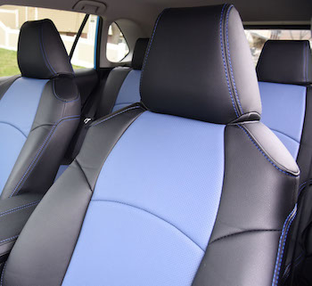 Covers and camo seat covers for the 2020 Toyota Tav 4. Genuine leather with a blue leather insert and black leather trim, and blue stitching.