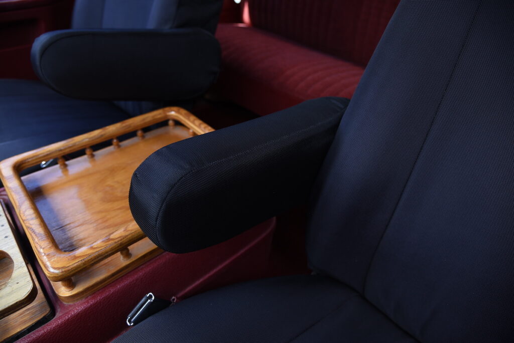 1991 Ford F-250 front seat armrest with black ballistic canvas cover