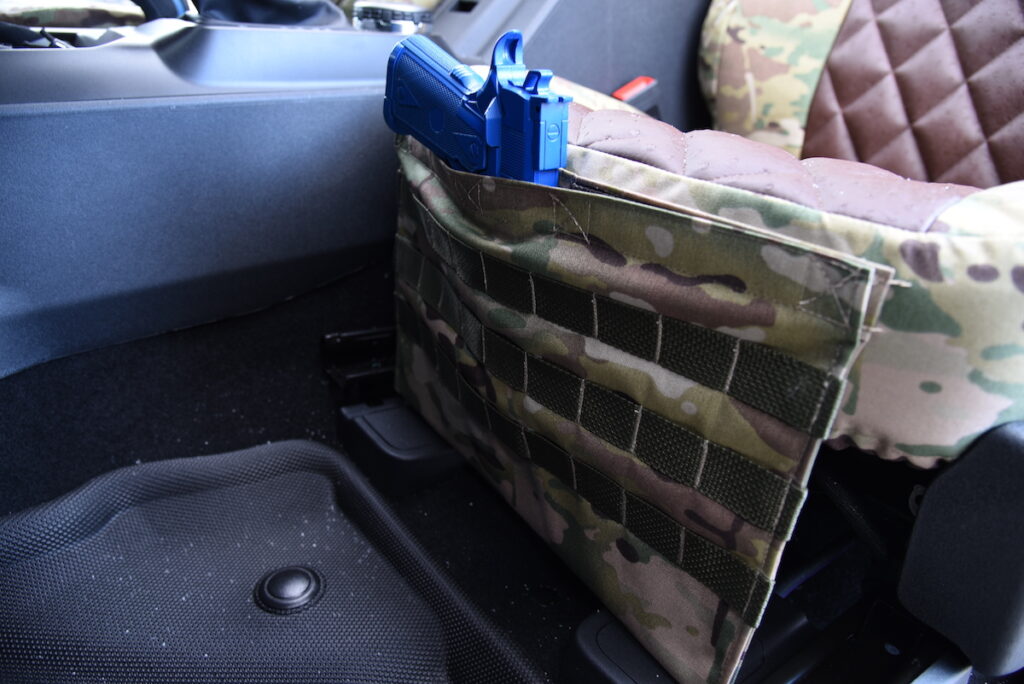 2023 Ford Bronco rear seat MOLLE panel in MultiCam Original camouflage with Brown Ostrich Diamond seats