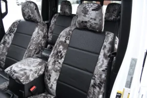 2023 Jeep Gladiator front Kryptek seat covers with Black Ostrich inserts and Kryptek Raid trim