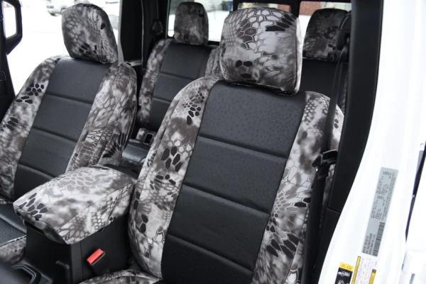 2023 Jeep Gladiator front Kryptek seat covers with Black Ostrich inserts and Kryptek Raid trim