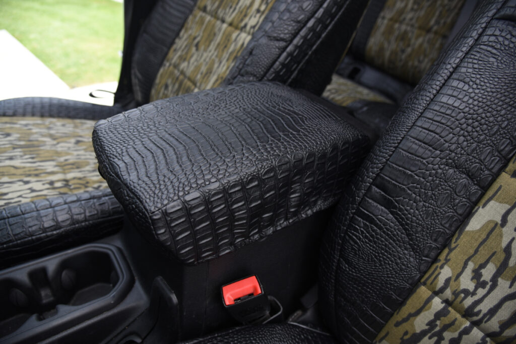 2020 Jeep Gladiator center console cover in Midnight Croc with Mossy Oak Bottomland seat inserts