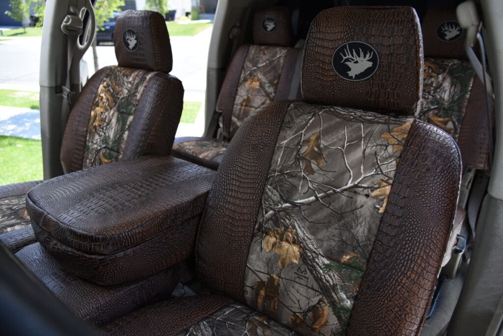 2006 Dodge RAM 3500 front seats and center armrest with Realtree Xtra and Java Croc realtree seat covers