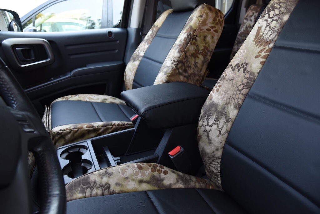 2013 Honda Ridgeline interior with center console and Kryptek Highlander seat covers