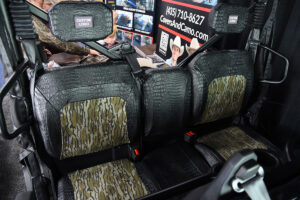 2026 CFMOTO U10 rear interior with Mossy Oak Bottomland inserts and Midnight Croc trim