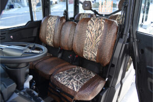 2026 Can-Am Defender 
 Insert: Mossy Oak Shadow Grass Blades (Canvas)
 Trim: Java Croc (Sim. Leather)
 Product: UTV