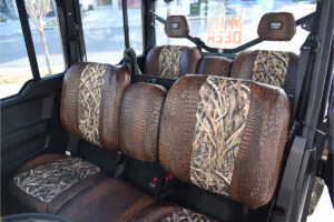 2026 Can-Am Defender 
 Insert: Mossy Oak Shadow Grass Blades (Canvas)
 Trim: Java Croc (Sim. Leather)
 Product: UTV