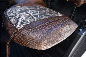 2026 Can-Am Defender 
 Insert: Mossy Oak Shadow Grass Blades (Canvas)
 Trim: Java Croc (Sim. Leather)
 Product: UTV