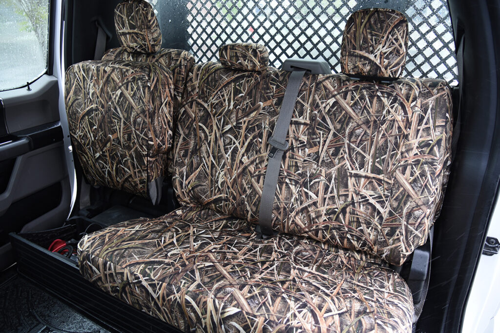 Rear bench view of 2019 Ford F-550 seat covers in Mossy Oak Shadow Grass Blades camouflage