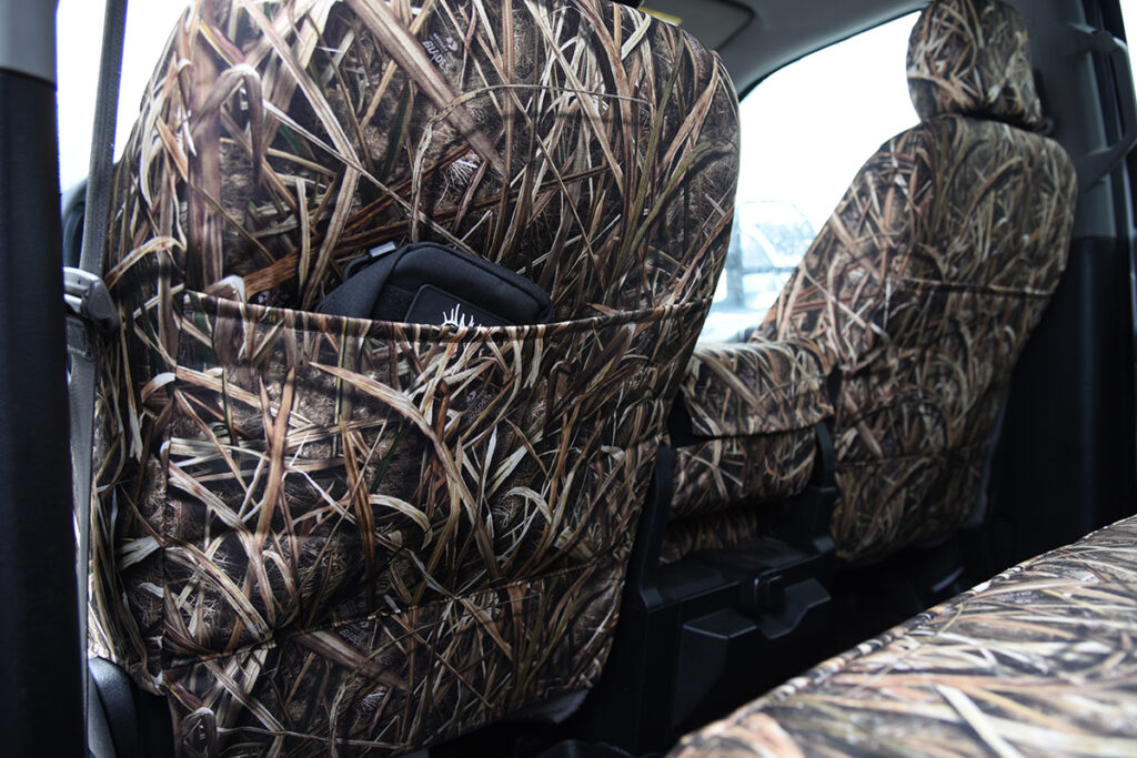 Rear pocket view of 2019 Ford F-550 seat covers in Mossy Oak Shadow Grass Blades camouflage