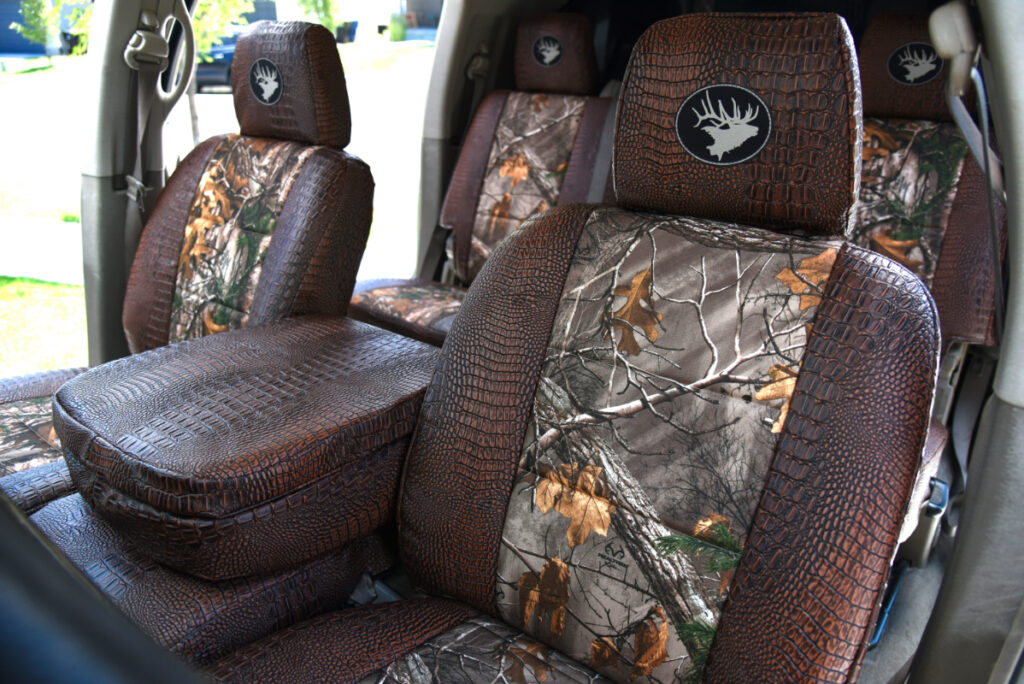 2006 Dodge RAM 3500 front seats and center armrest with Realtree Xtra and Java Croc realtree seat covers