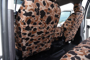 2018 Ford F-350 front seat back with Duck Camo seat cover and storage pocket