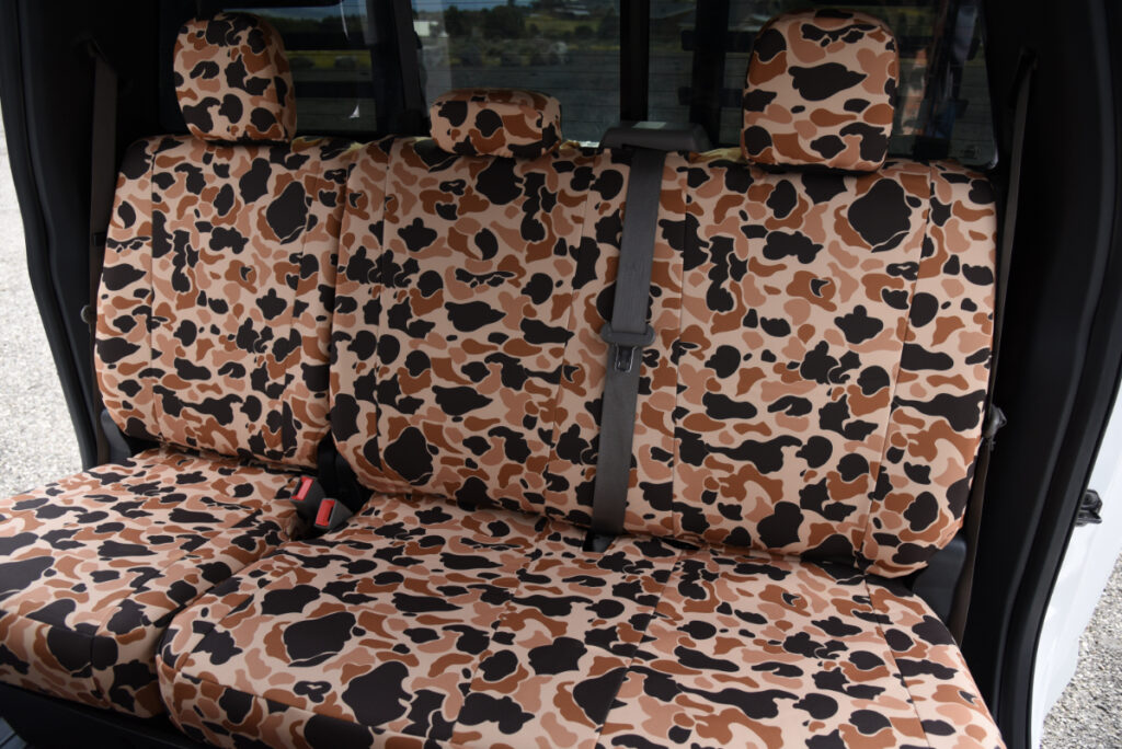 2018 Ford F-350 rear bench seat with Duck Camo seat covers and matching headrests