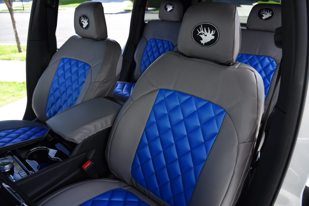 2023 Jeep Grand Cherokee front seat covers with Blue Leatherette Diamond inserts and Medium Gray Sof-Touch trim