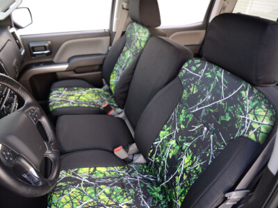 2018 GMC Sierra 2500 front seat covers with Sirphis Toxic camouflage inserts and Black Dura EZ-Care trim