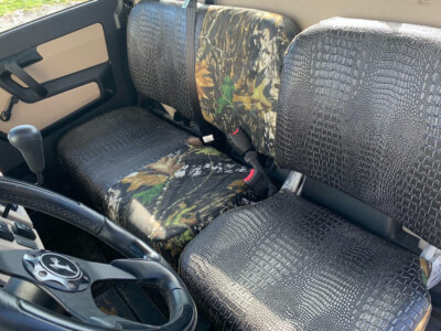 2018 John Deere Gator XUV 835 seat covers with Ebony Croc E40 trim and Mossy Oak New Break-Up C67 inserts
