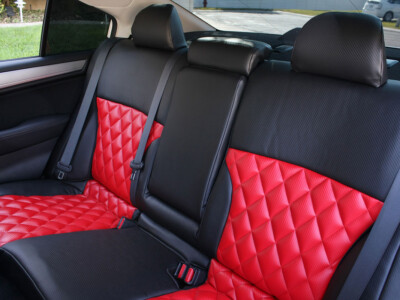 2018 Subaru Legacy rear Leatherette seat covers with Red Carbon Fiber diamond-quilted inserts and Black Carbon Fiber trim
