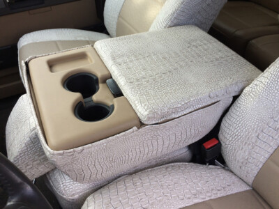 2011 Ford F-350 center console cover in Sandstone Ostrich and Bone Croc leatherette
