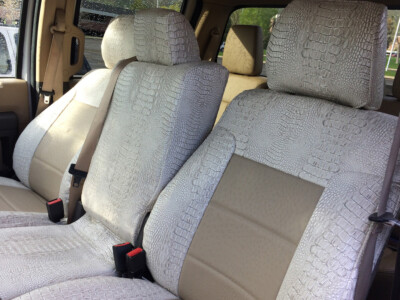 2011 Ford F-350 front seat covers in Sandstone Ostrich and Bone Croc trim