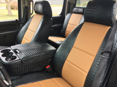 2014 GMC Sierra 3500 front Alligator seat covers with Caramel Sof-Touch inserts and Midnight Croc trim