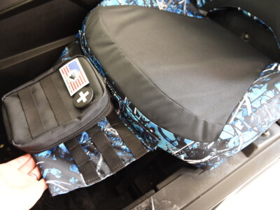 2023 Can-Am Commander center console cover with Sirphis Undertow trim and MOLLE storage panel