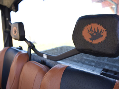 2023 Can-Am Defender headrest with Covers & Camo logo on Saddle Ostrich UTV seat covers