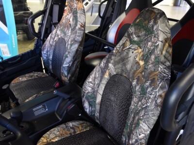 2021 Kawasaki Teryx front UTV seat covers with Ebony Croc inserts and Realtree Xtra camouflage