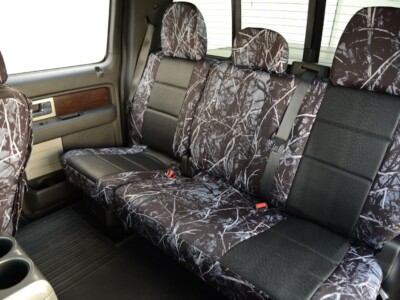 <b>
2014 Ford F150
</b>
<br>
Insert: Black Ostrich E01 (Sim. Leather)
</br>Trim: Sirphis® Harvest Moon® C52 (Canvas)
<br>Product: Camo - Gold Series </br> | Covers and Camo