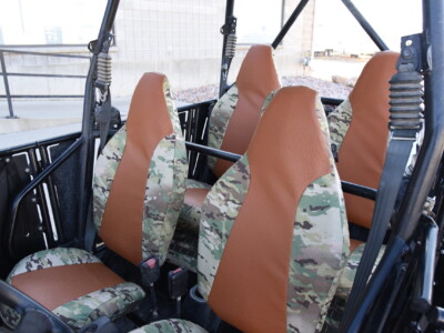 2012 Polaris RZR front UTV camo seat covers with Saddle Ostrich simulated leather inserts and MultiCam Original canvas trim