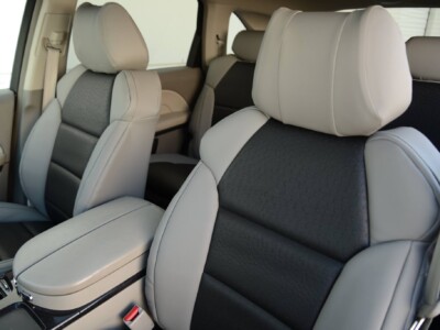 <b>
2012 Acura MDX 
</b>
  <br>
         Insert: Black Ostrich E01 (Sim. Leather)
  </br>Trim: Medium Gray SofTouch S14 (Sim. Leather) 
</br>Product: Exotic - Gold Series Covers And Camo seat covers Black Ostrich and gray SofTouch simulated leather for Acura MDX front seats close up