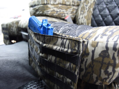 2009 RAM 2500 seat covers in Midnight Croc Diamond Stitch and Mossy Oak Bottomland camouflage