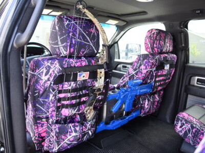 2014 Ford F-150 seat back MOLLE panel with Sirphis Muddy Girl camouflage trim and gear storage