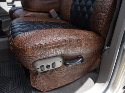 <b>
2009 RAM 2500 
</b>
<br>
Insert: Midnight Croc Diamond (Sim. Leather)
</br>Trim: Java Croc E42  (Sim. Leather)
</br> Product: Exotic- Gold Series | Covers and Camo
