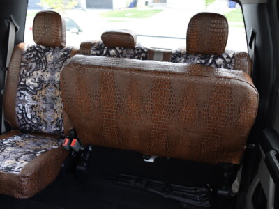 <b>
2019 Ford F-350
</b>
  <br>
         Insert: Goldberg Bone N Stone C74 (Canvas)
  </br>Trim: Java Croc E42 (Sim. Leather)
<br> Product: Camo - Gold Series </br> 2019 Ford F-350 Rear Seat under seat view Camo seat covers Goldberg Bone N Stone insert with Java Croc trim Covers And Camo