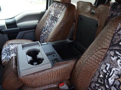 <b>
2019 Ford F-350
</b>
<br>
Insert: Goldberg Bone N Stone C74 (Canvas)
</br>Trim: Java Croc E42 (Sim. Leather)
<br> Product: Camo - Gold Series </br> 2019 Ford F-350 middle 20 section Custom Seat Cover in Java Croc Covers and Camo