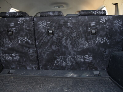 2008 Toyota FJ Cruiser folded rear seat covers with Black HD1000 inserts and Kryptek Typhon trim